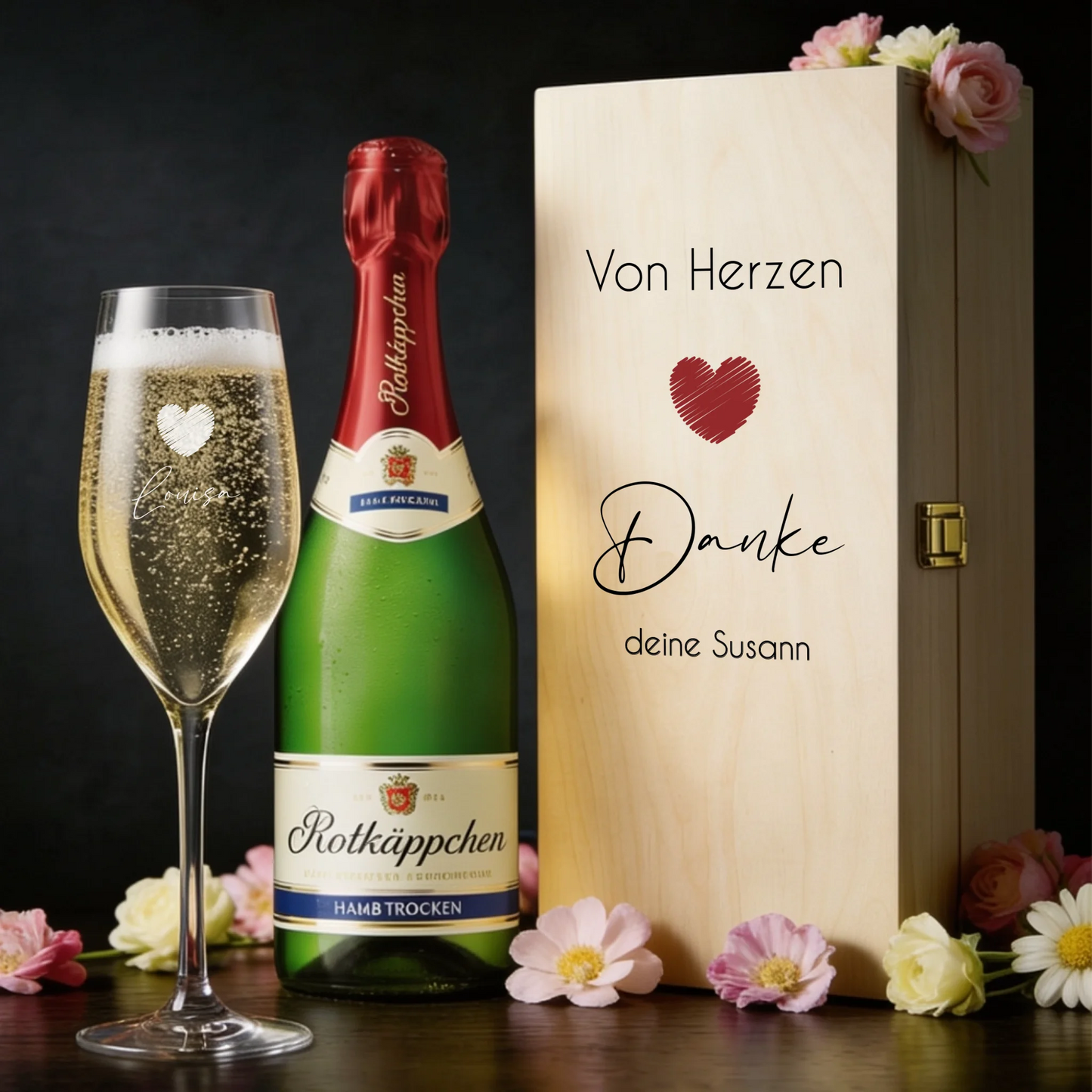 Personalisiertes Sektglas mit individueller Gravur in edler Holzbox
